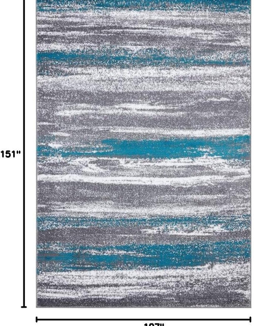 Load image into Gallery viewer, Modern Abstract Turquoise 9X12 Area Rug
